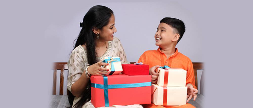 Brother is going to give his sister a gift for Christmas or New Year Stock  Photo by ©liudaboich.gmail.com 93917700